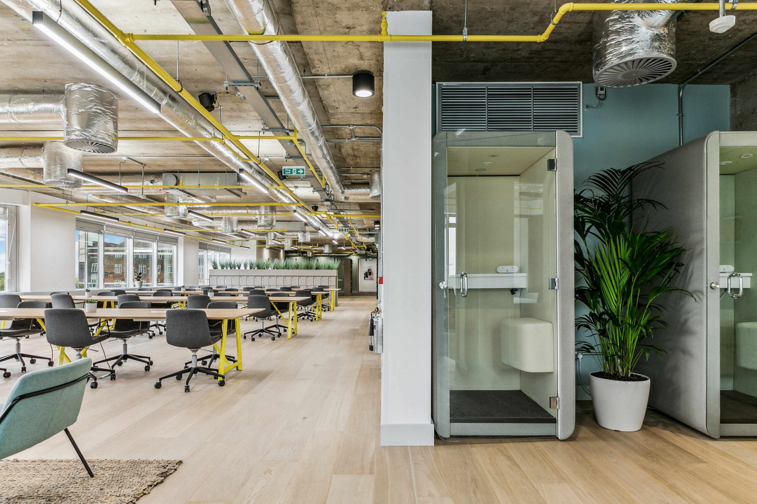 Huddle Hammersmith Coworking Space with Desk Chairs and Phone Booth